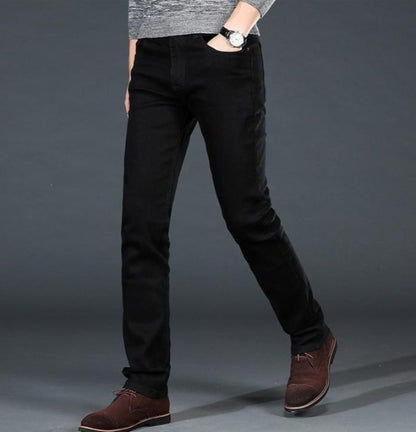 Black jeans for men in full-length view displaying straight fit design