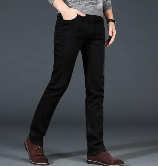 Men's black jeans styled in smart casual outfit with shirt and shoes