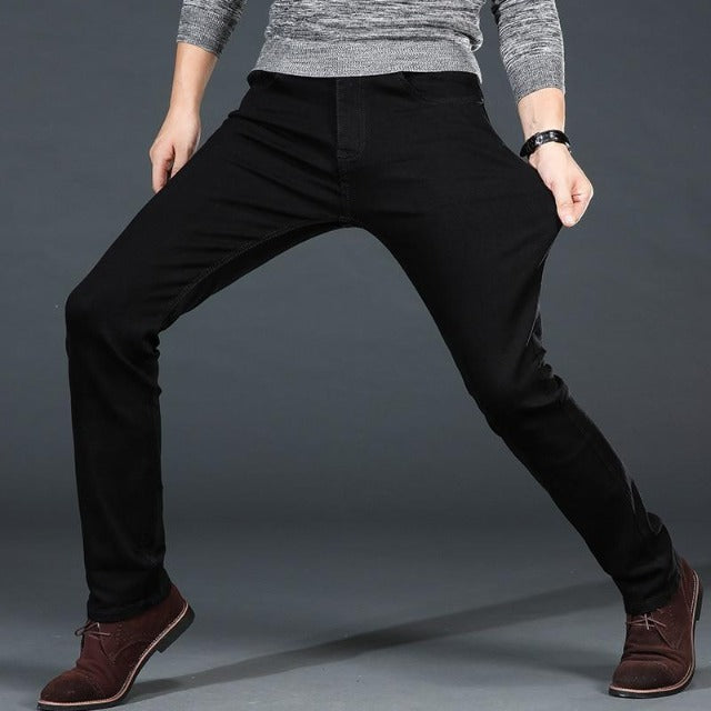 Men's casual black jeans in slim fit showing front view and clean silhouette