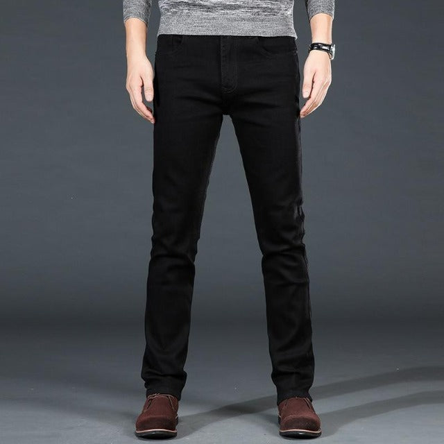 Men's casual black jeans in slim fit showing front view and clean silhouette